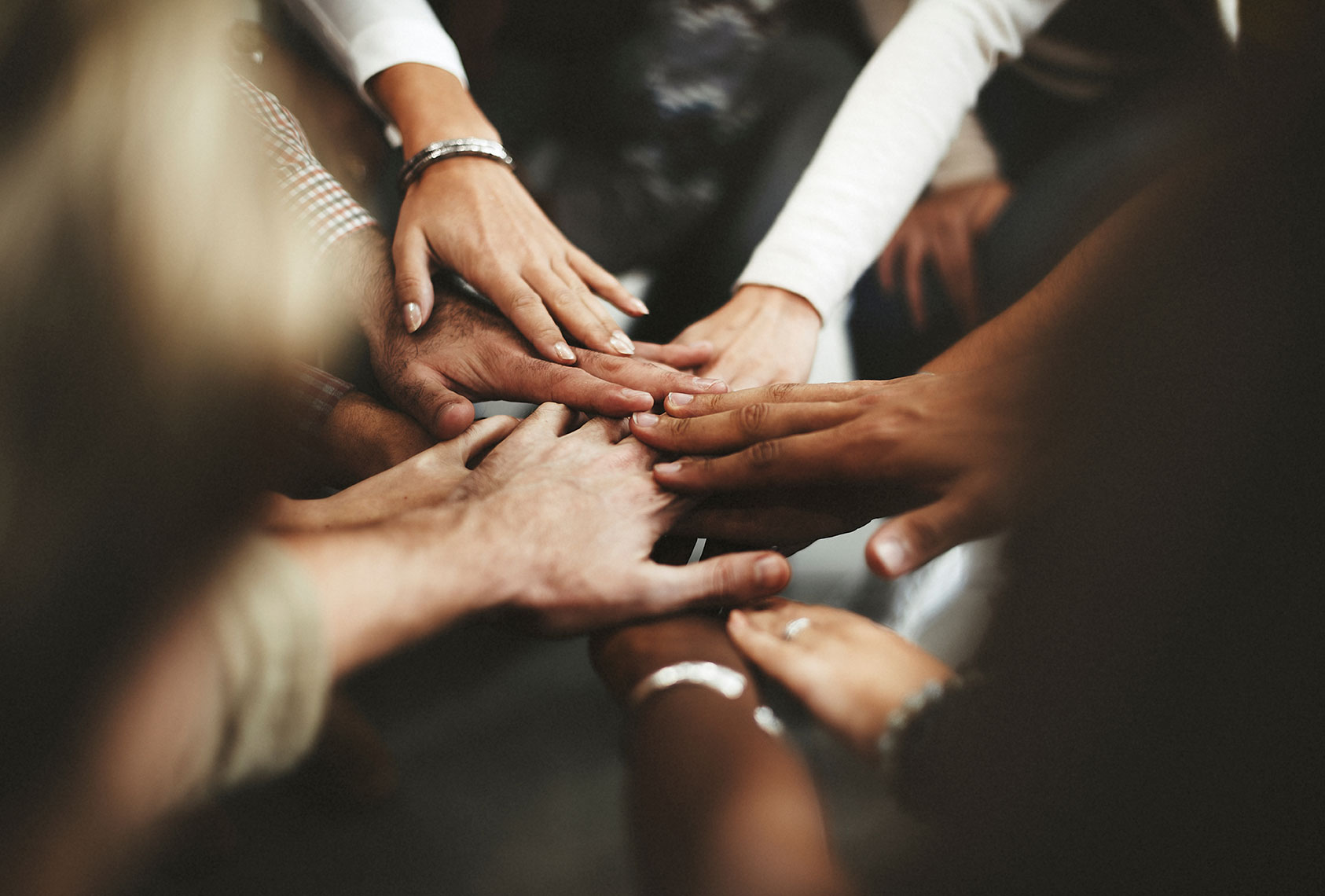 https://www.ukbrokerlink.com/images/uploads/Diverse-Hands-Together.jpg